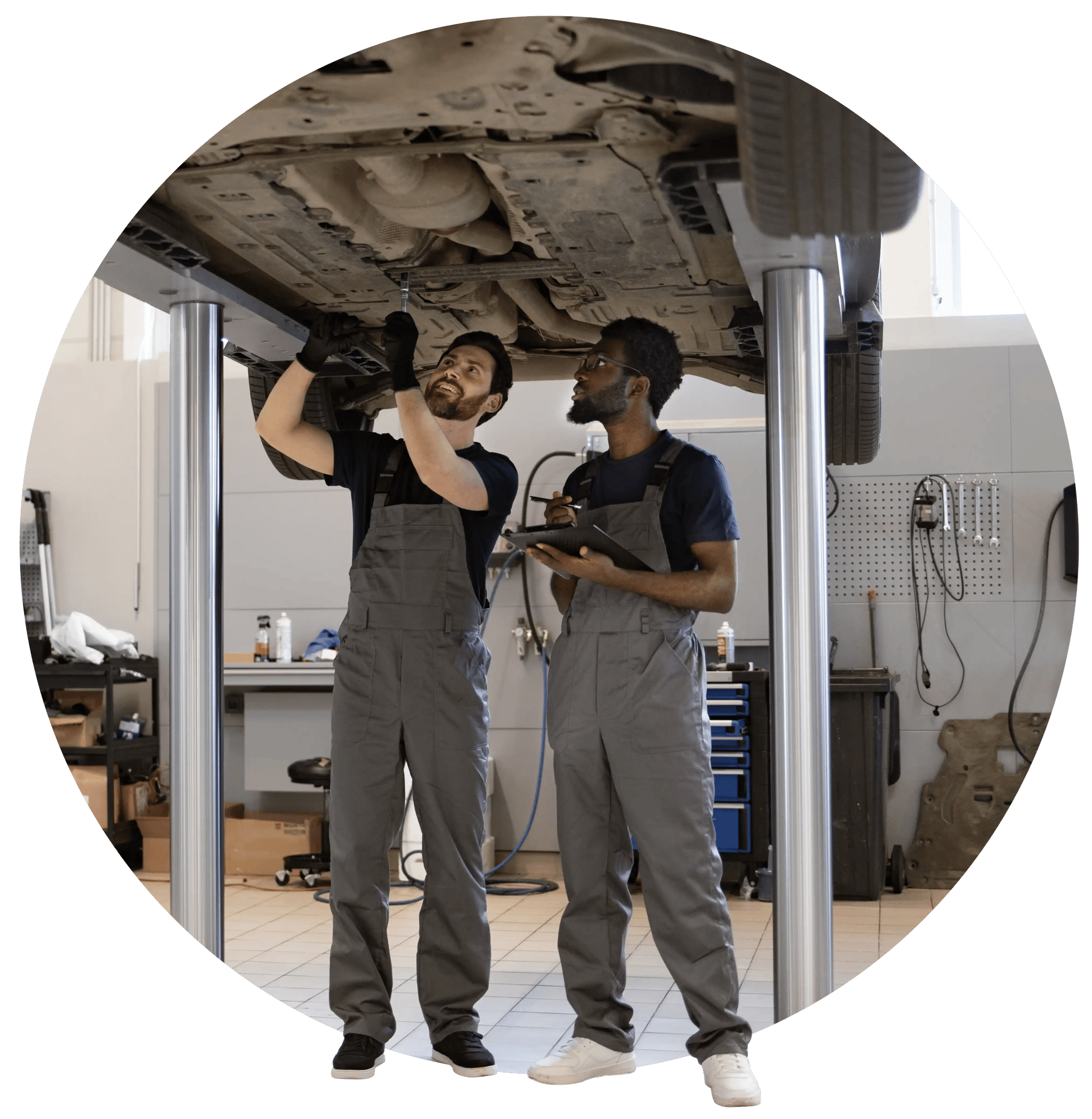 mechanics under car mechanics under car